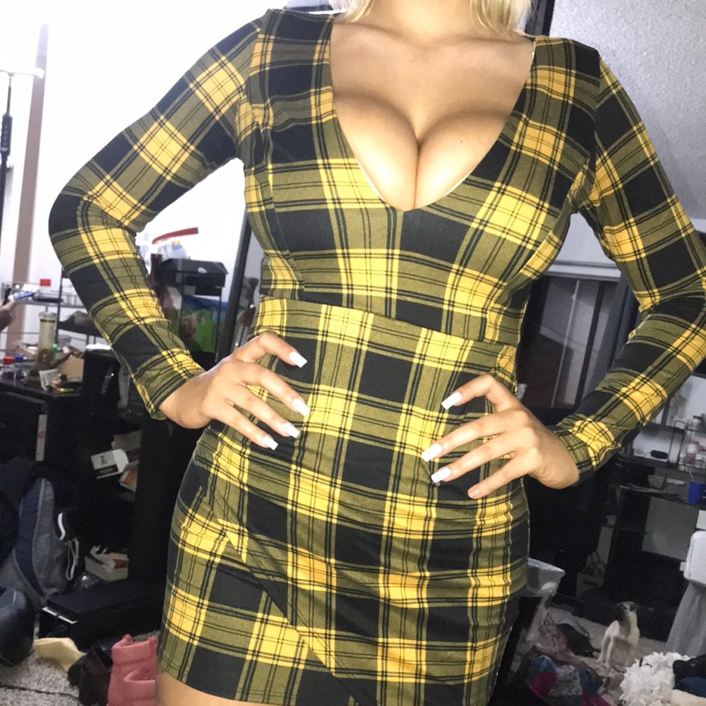 Tags on never worn dress
